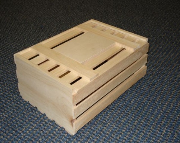  Custom slatted wooden crates with a sliding slat top, shown unfinished, available in bulk for packaging, storage, and product display.